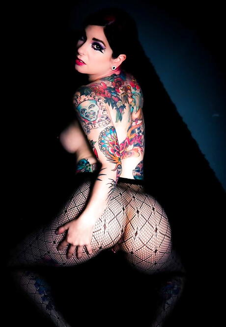 Enticing american milf Joanna Angel in sexy pantyhose reveals big boobs and cute pussy 